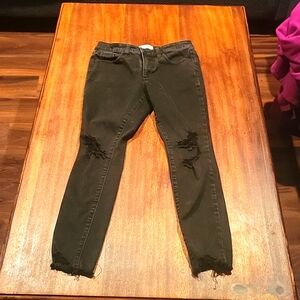 Womens- size 2/26s- Black mid-rise- skinny with Stretch- distressed jeans.
